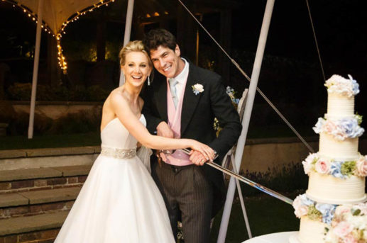 Wedding couple cutting a cake